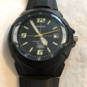 Casio Black Watch with Yellow Second Hand and Green Lume